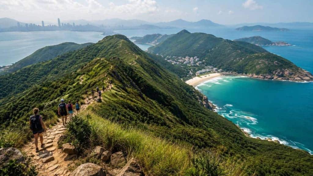 Hikers on the Dragon’s Back ridge above Big Wave Bay, Hong Kong