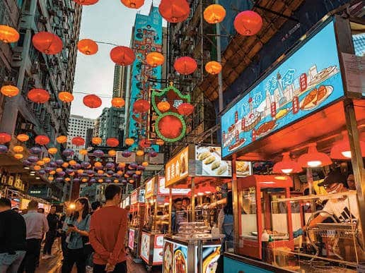 Lanterns and food stalls at Temple Street Night Market in Kowloon
