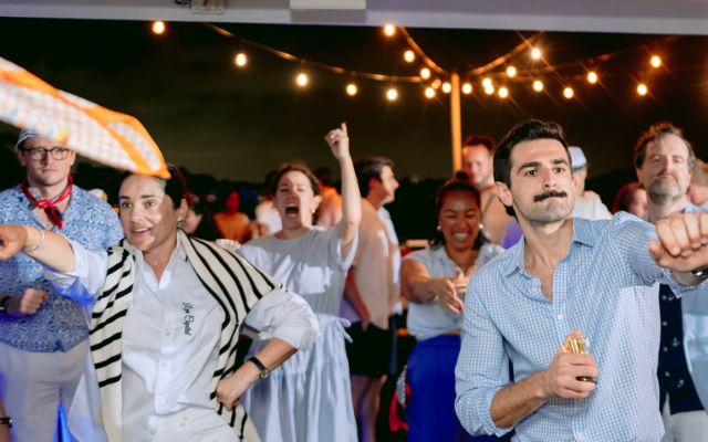 Laurel team celebrating at an evening party