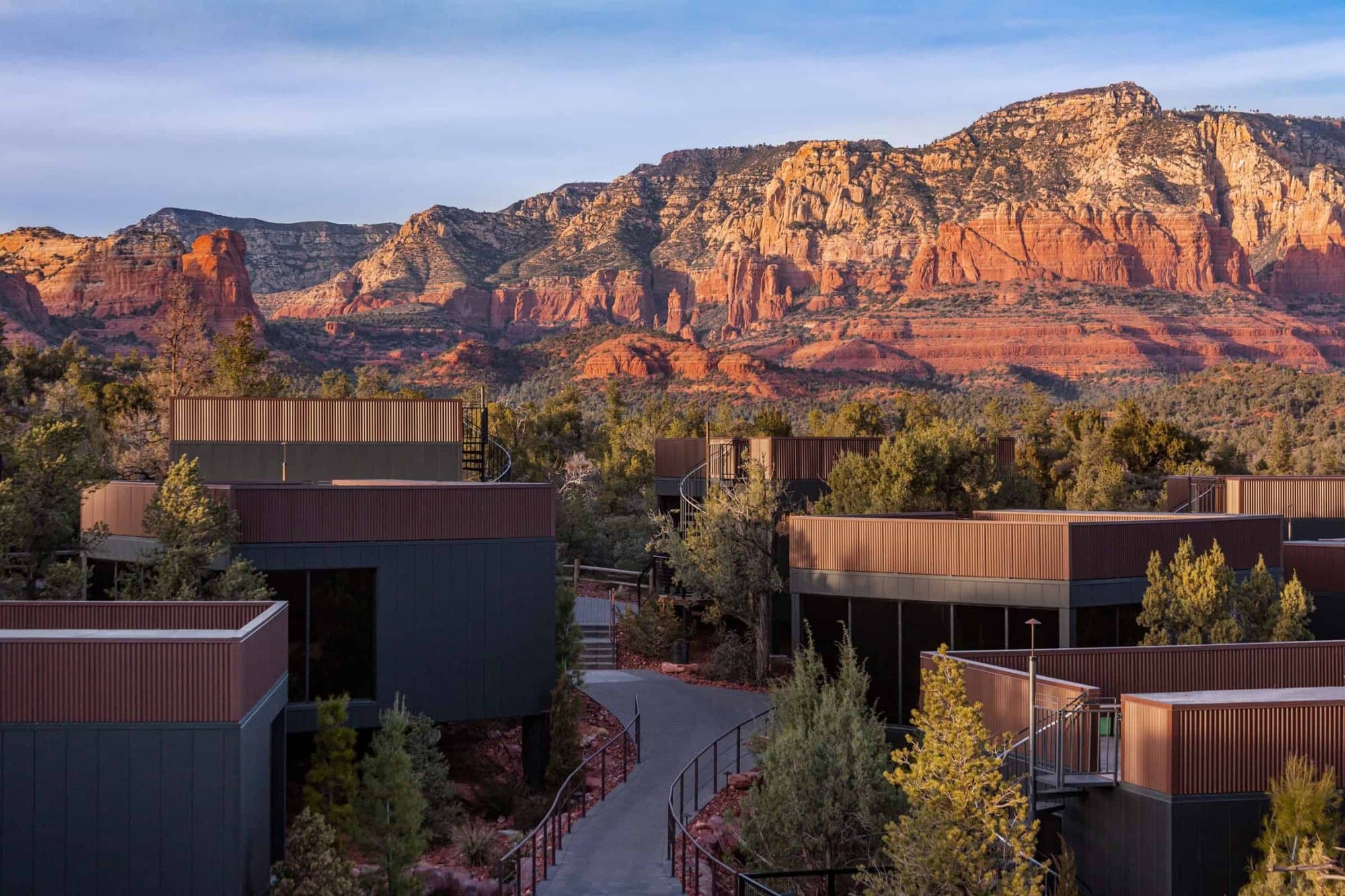 Ambiente atriums below Sedona red rocks at sunset