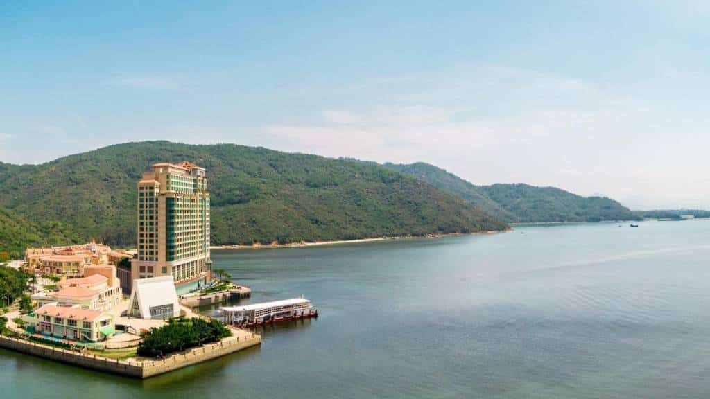 Auberge Discovery Bay beside the beach and hills of Lantau Island