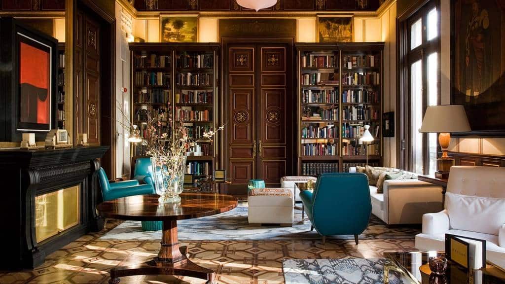 Library lounge at Cotton House Hotel in a 19th-century Barcelona landmark
