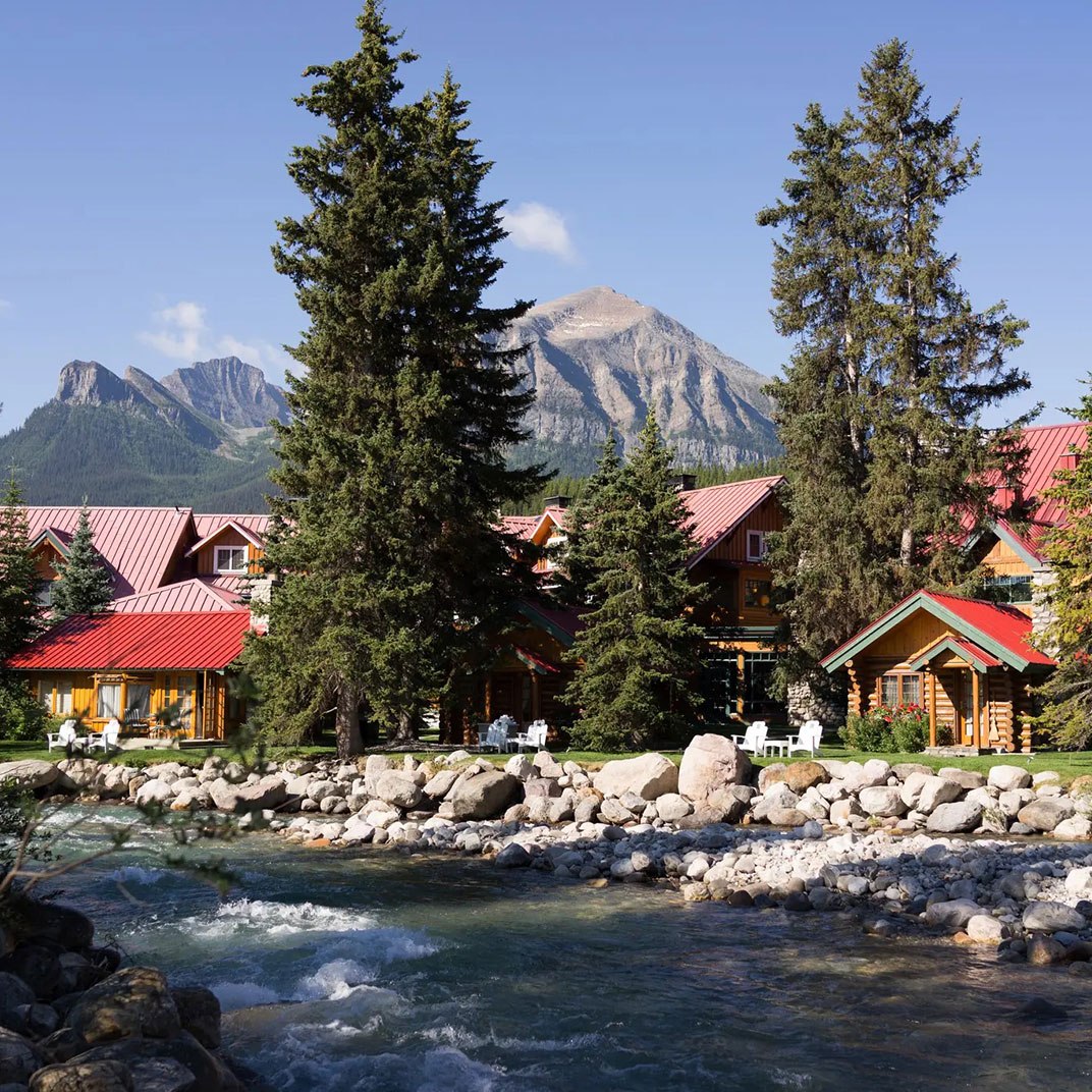 Post Hotel and log cabins on the Pipestone River, Lake Louise