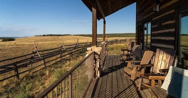 Covered porch overlooking the meadow at Zion Mountain Ranch