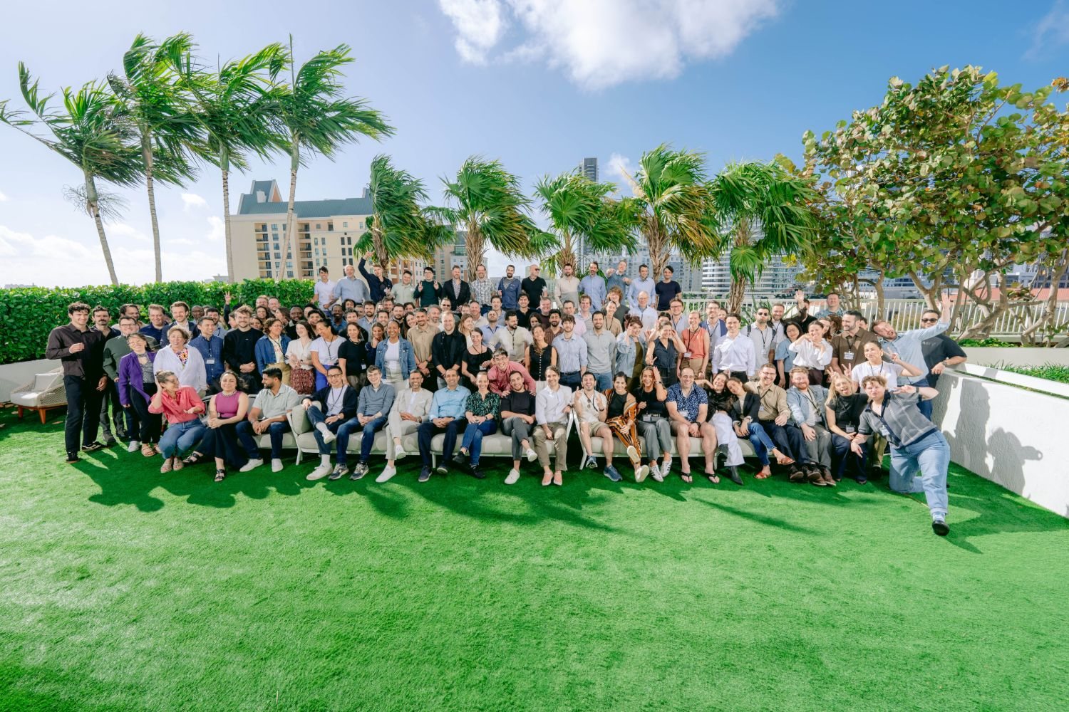 Laurel's team gathered on a rooftop lawn in Fort Lauderdale